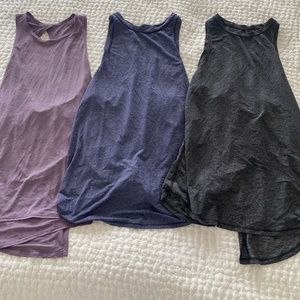 3 Lululemon tanks size 4